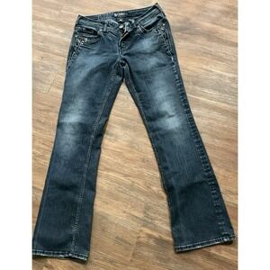 These are Silver Jeans Co. Suki Mid Rise Bootcut Jeans